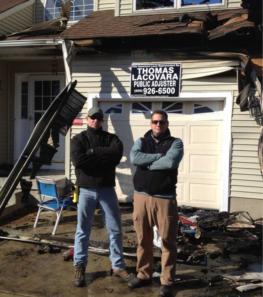 Thomas Lacovara and John Ross on-site at a fire-damaged property